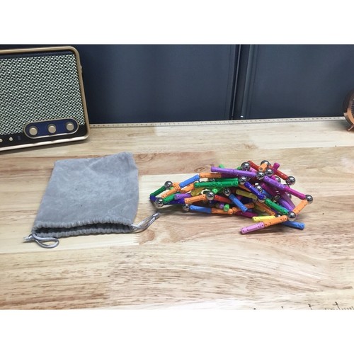 Magnetic balls and - balls, ,